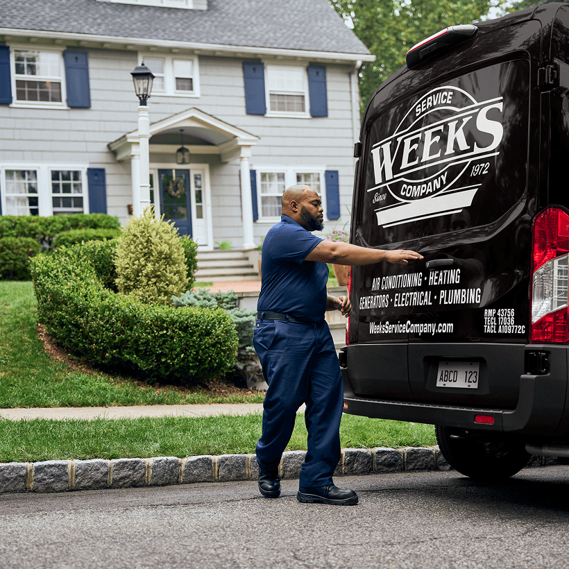 A Weeks technician arrives at a home ready to provide expert HVAC, plumbing, and electrical services.