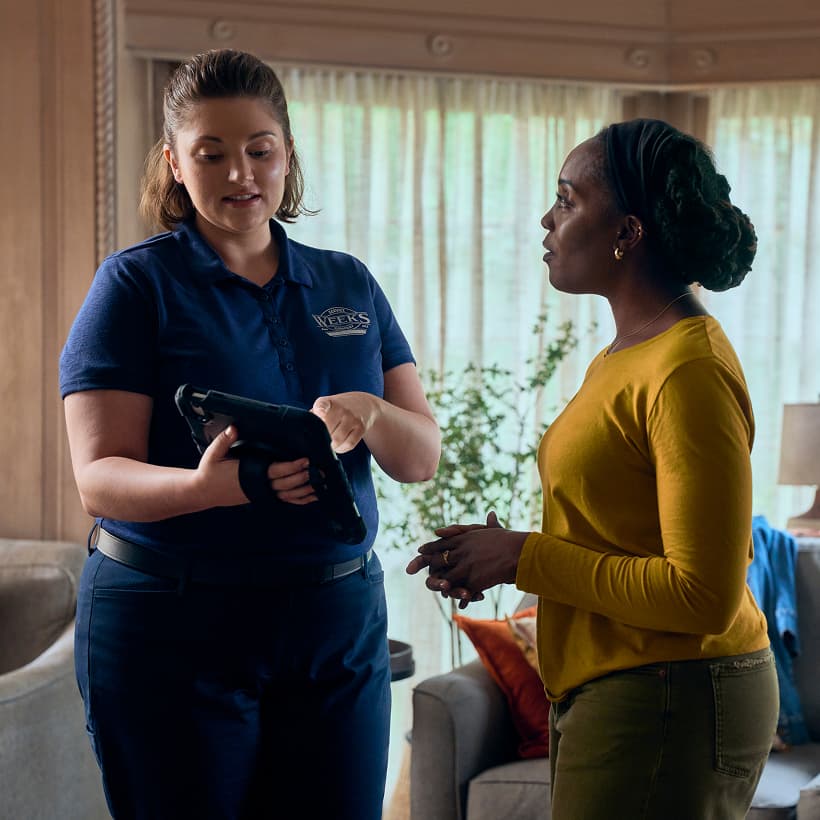 A Weeks Comfort Advisor discuss our Comfort360 Membership benefits with a homeowner.